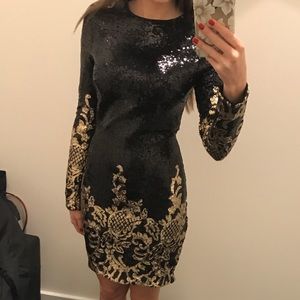Black and gold sequin dress